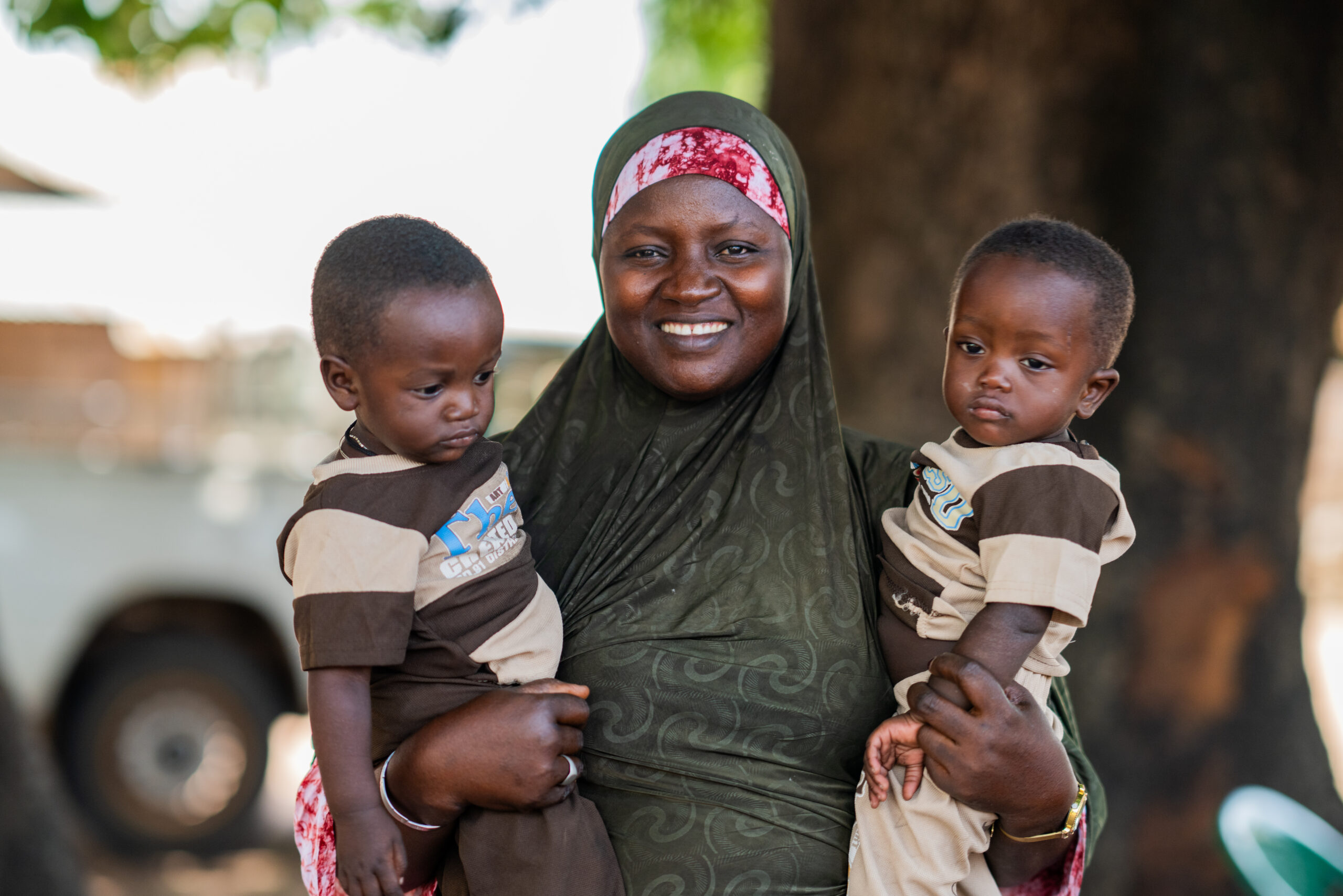 2025_Gender_Cambeidari_Guinea Bissau_Happy mother carrying her twin sons_038